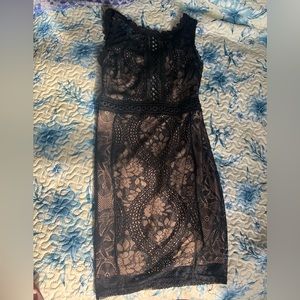 Black lace and nude dress